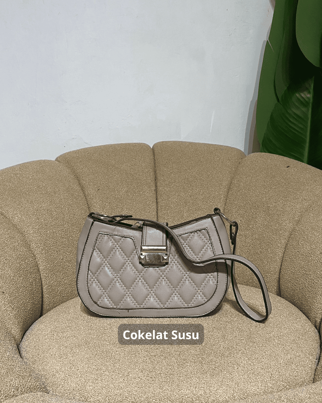 Tas slempang Gomez