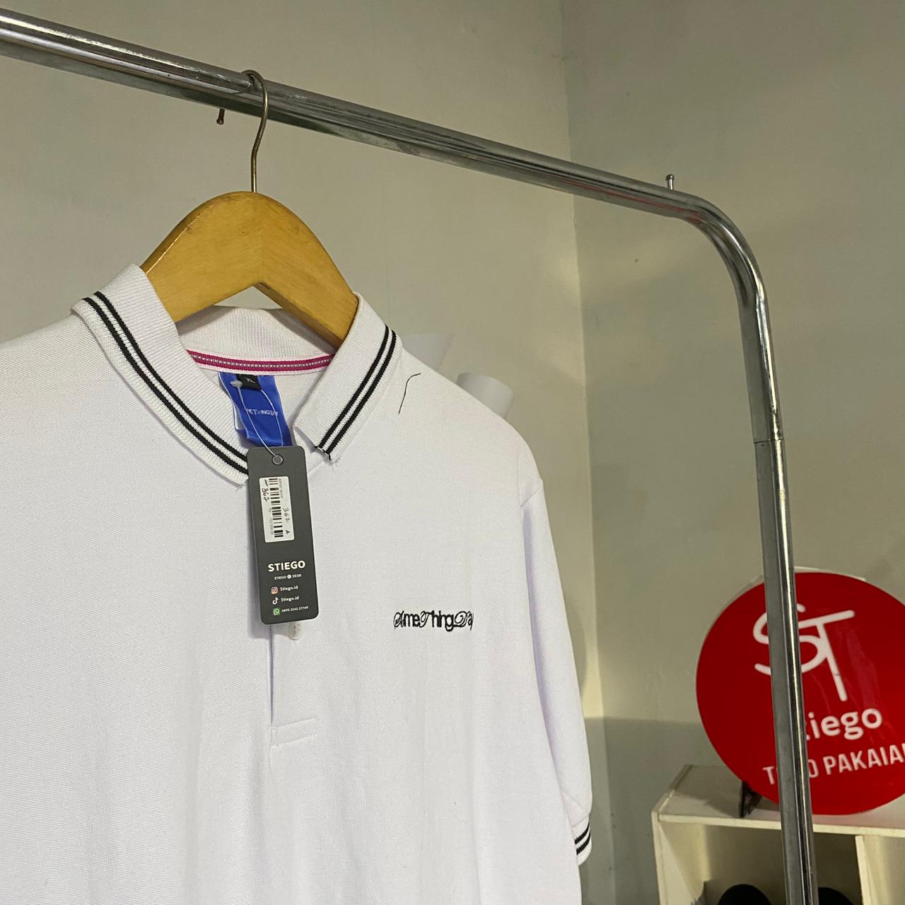 Atasan koos polo ame  pria lengan pendek