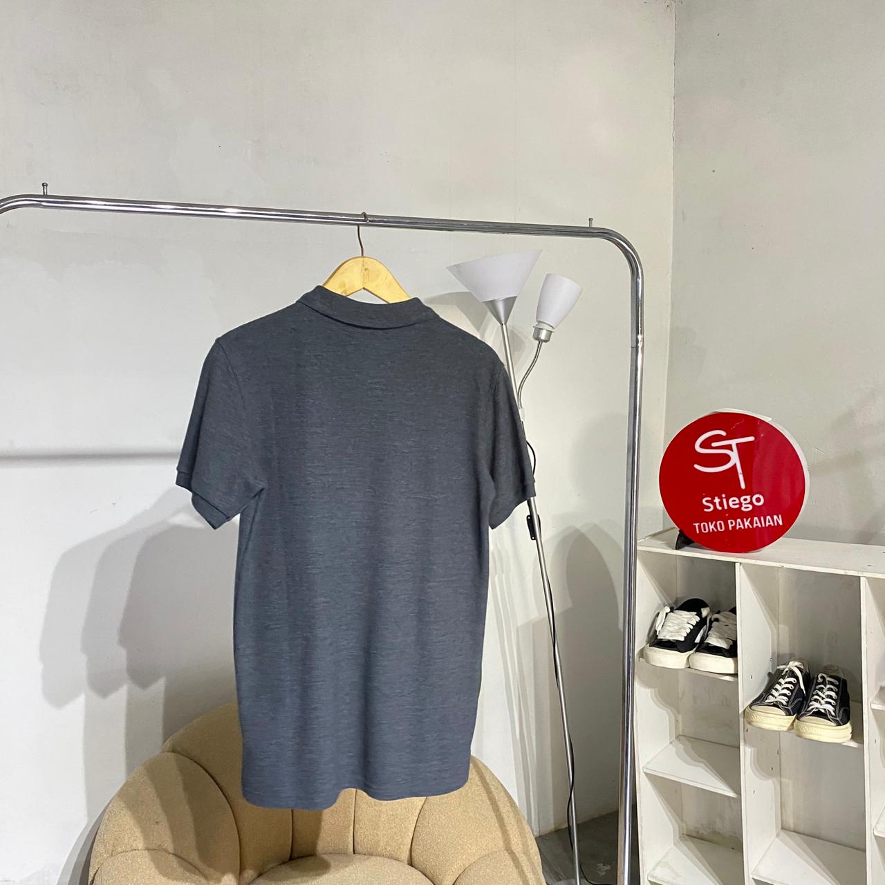Atasan kaos polo rismawear resleting pria lengan pendek